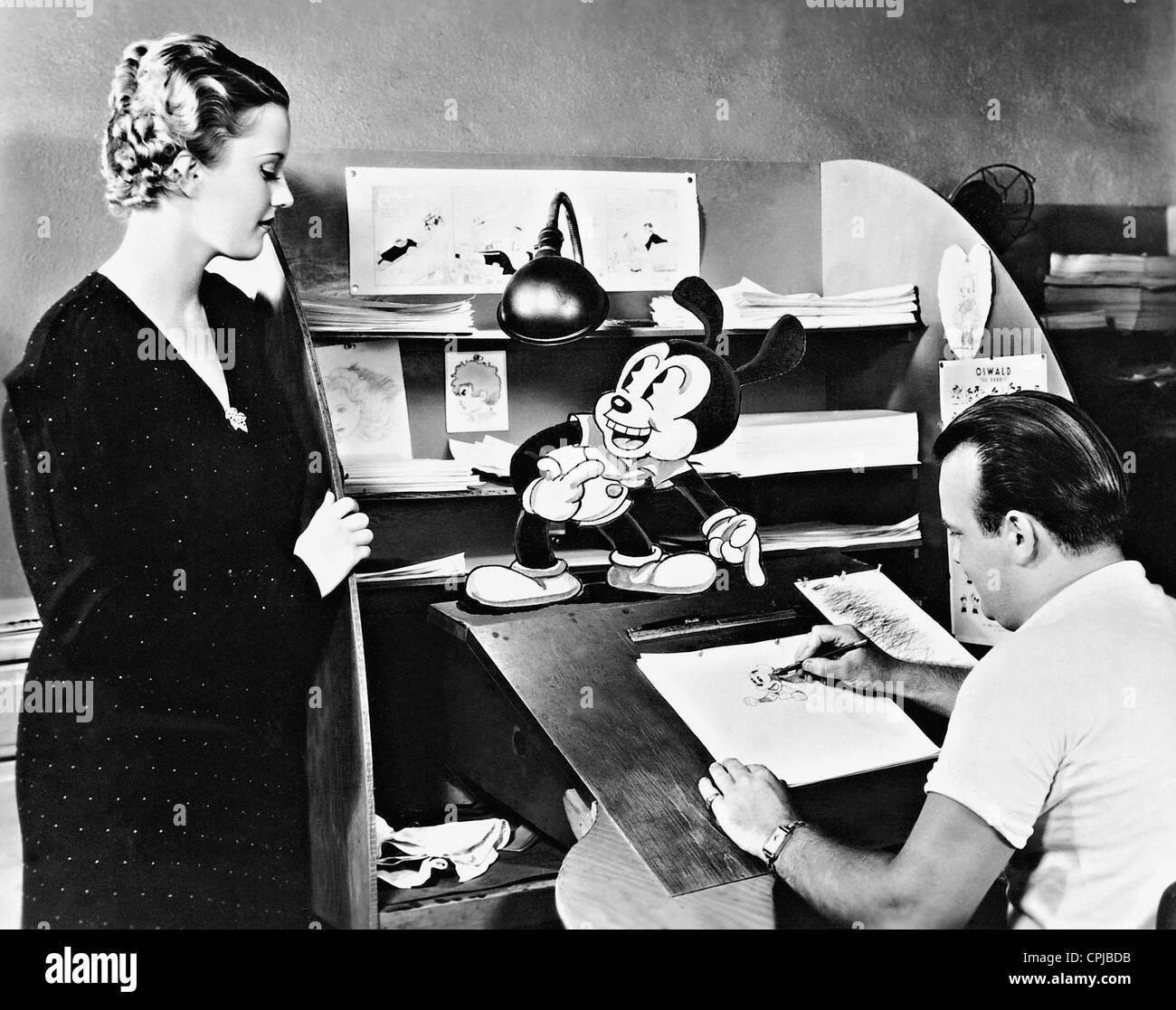 Phyllis Brooks, Tex Avery and the cartoon character Oswald, 1934 Stock Photo