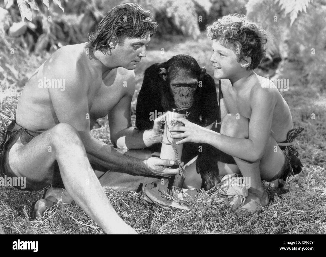 Johnny Weissmuller and Johnny Scheffield in 'Tarzan's Desert Mystery', 1943 Stock Photo