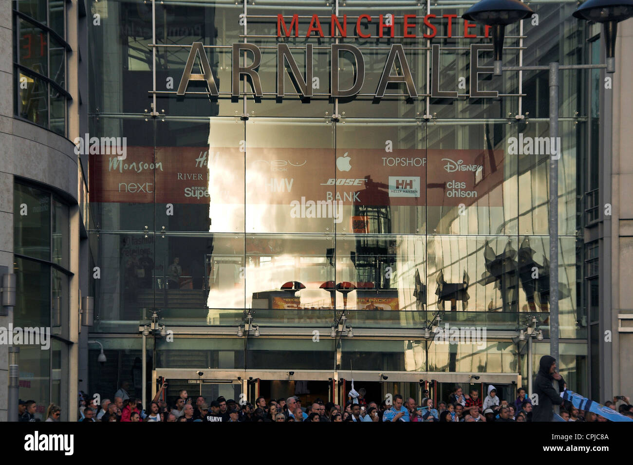 Supporters outside the Arndale Centre, Exchange Square, Manchester City Premier League Trophy Parade, 2012 Stock Photo