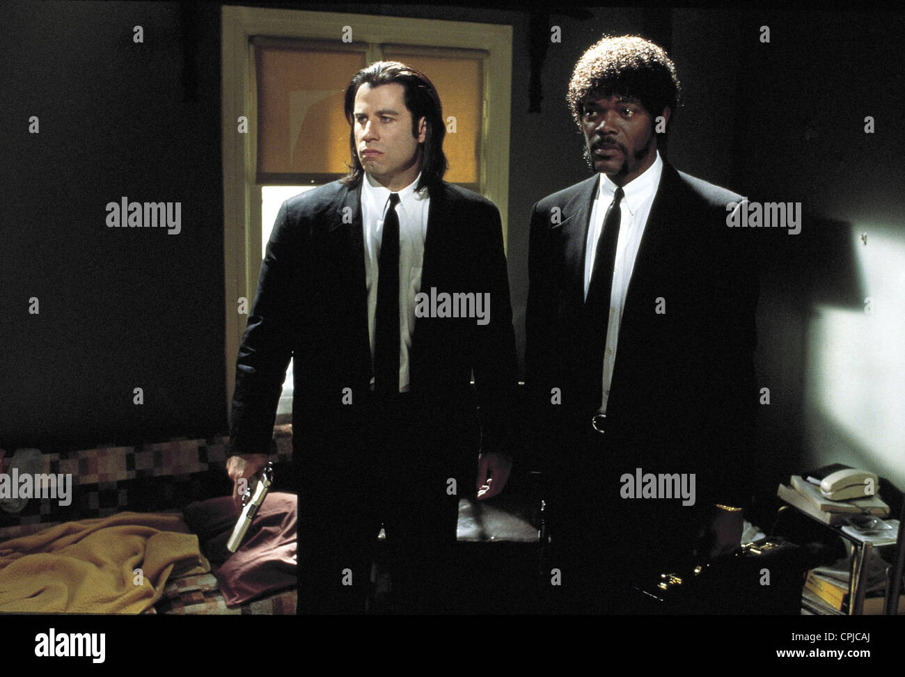 Pulp Fiction  Year : 1994 - USA Director : Quentin Tarantino John Travolta, Samuel L. Jackson   Palme d'Or  Cannes 1994 Stock Photo