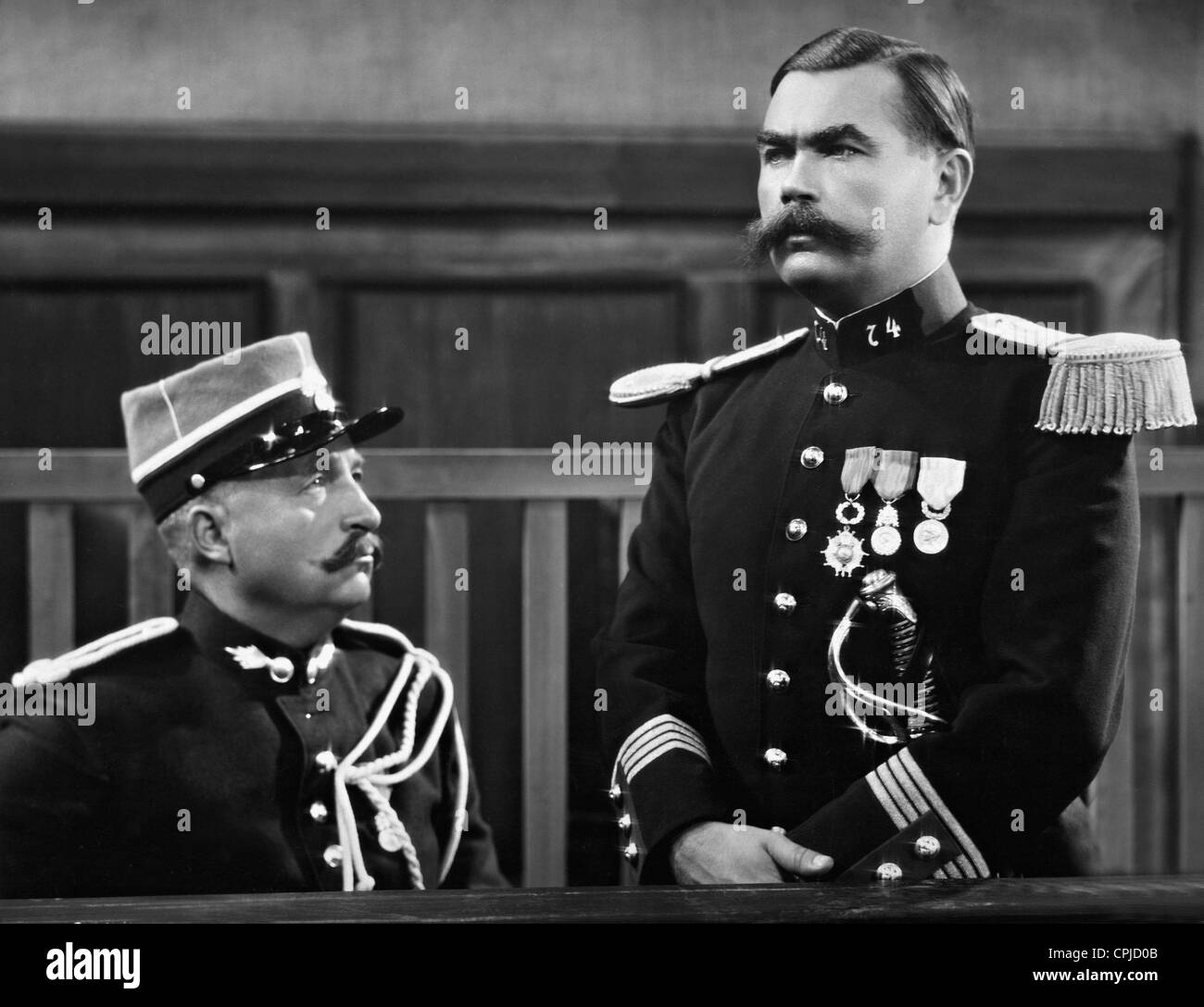 Oskar Homolka (R) as Major Ferdinand WalsinEsterhazy in the film 'The Dreyfus Case', Director