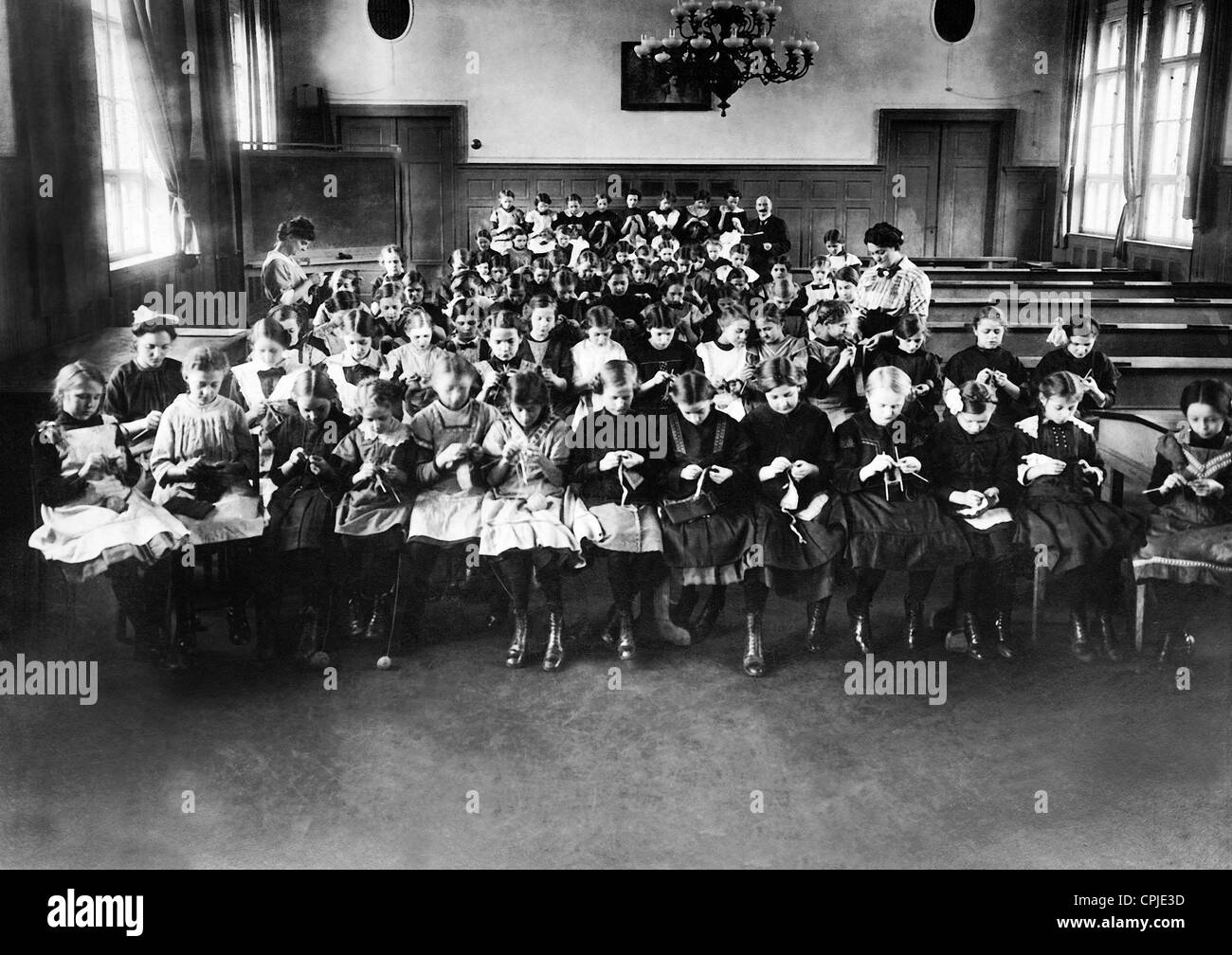 Girl students at the handiwork afternoon, 1918 Stock Photo