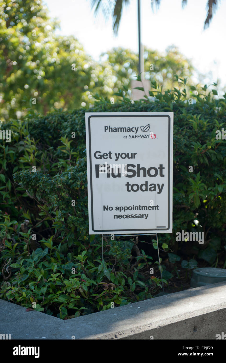 Sign outside a San Francisco pharmacy advising people to 'Get your Flu Shot Today' Stock Photo