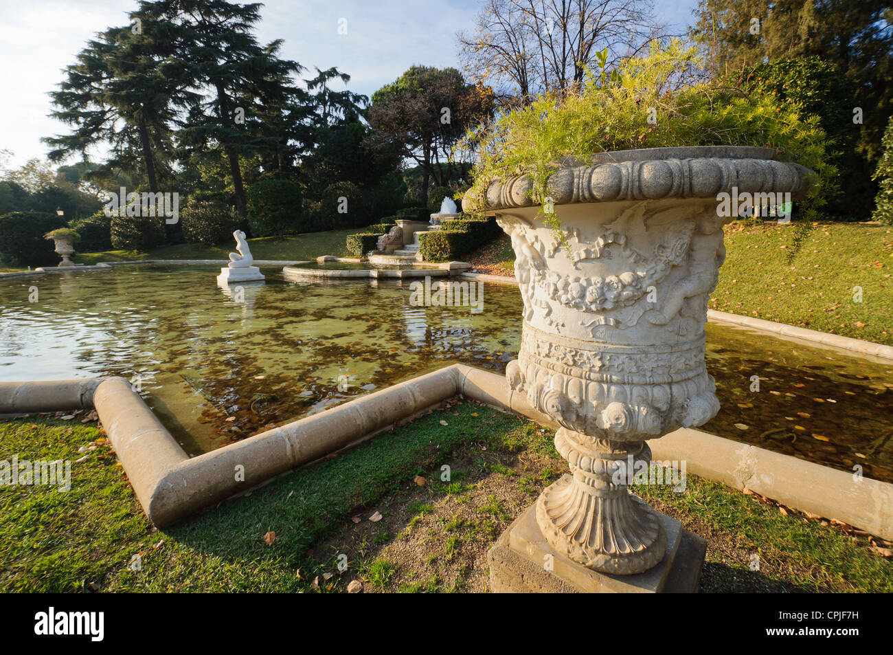 BARCELONA, SPAIN - DECEMBER 2011 : Pond with a woman statue in Park Pedralbes. Stock Photo