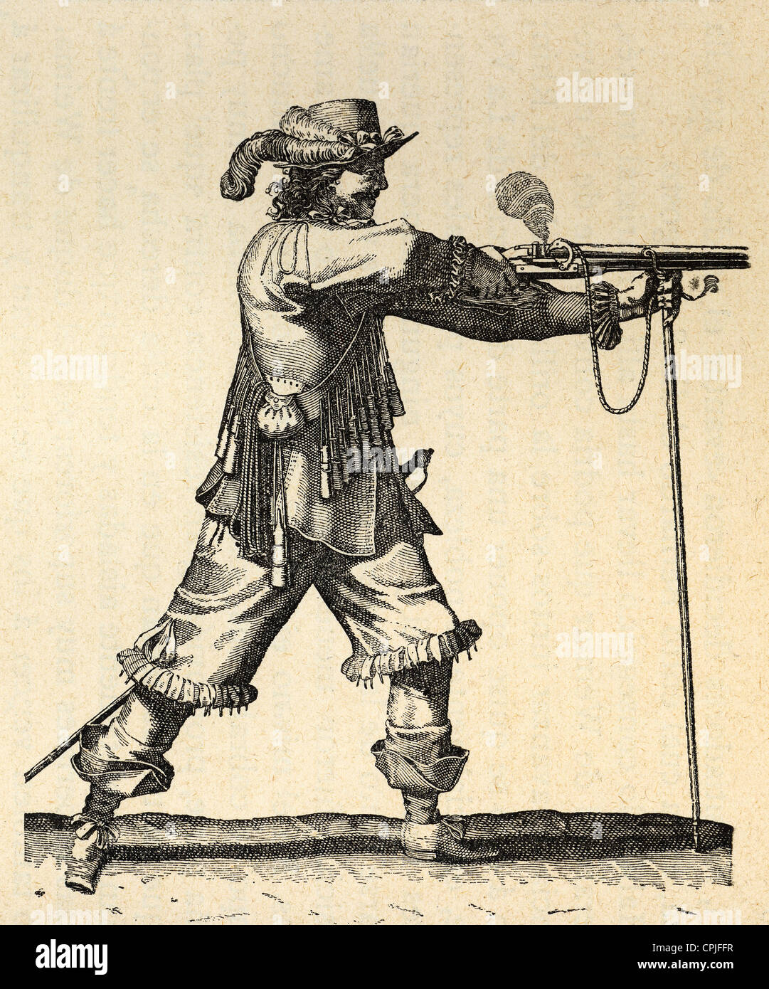 Army of the 18th century. France. Musketeer of the Infantry of Louis XIV firing the musket. Engraving. Stock Photo
