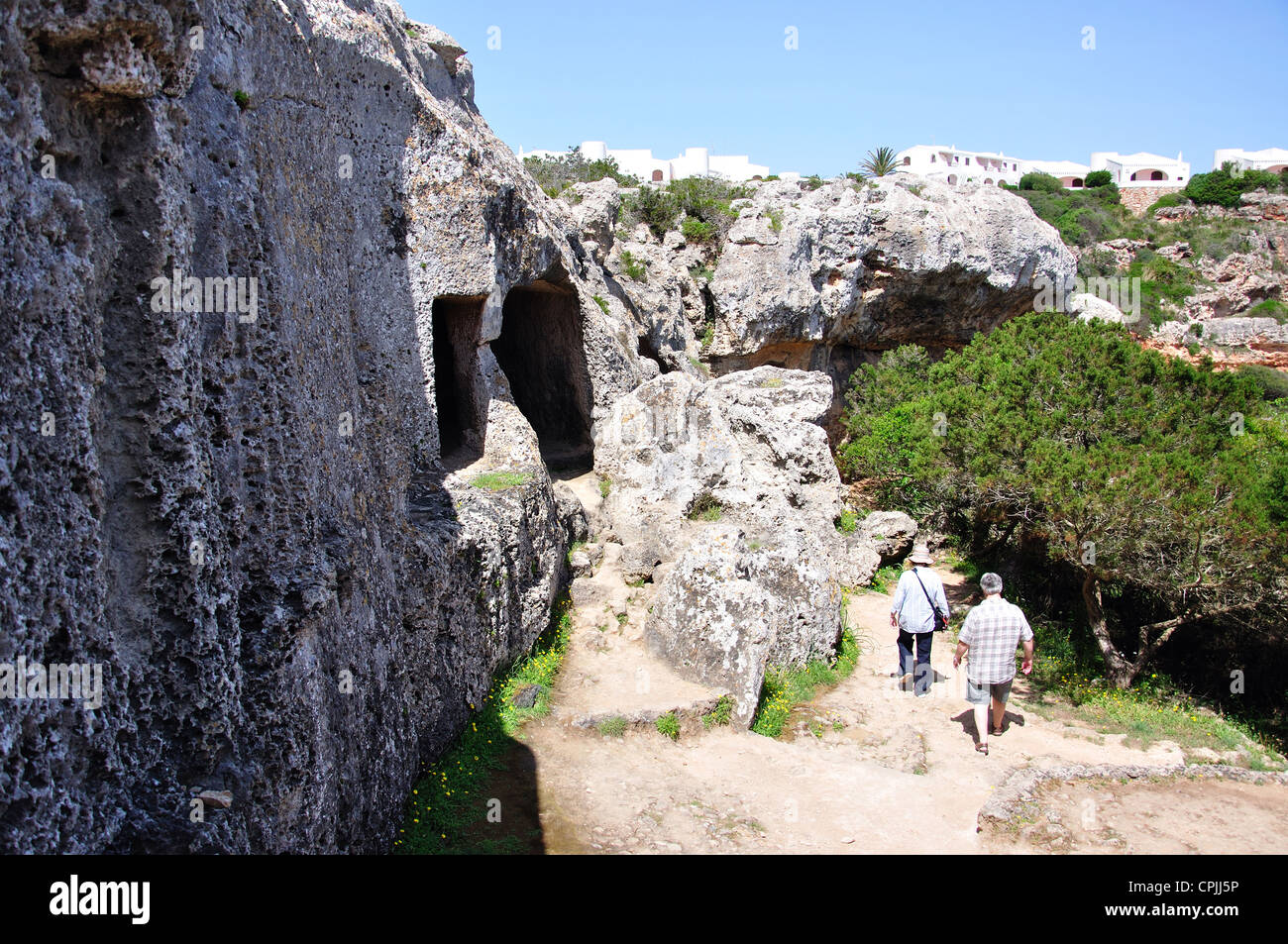 Caves at Cala Morell Necropolis archaeological site, Cala Morell, Menorca, Balearic Islands, Spain Stock Photo