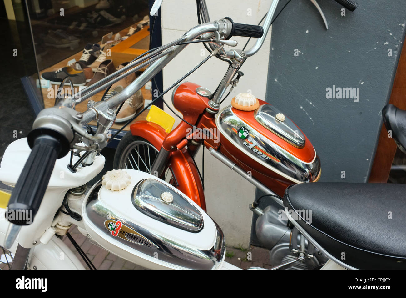 A pair of vintage / retro Puch mopeds Stock Photo