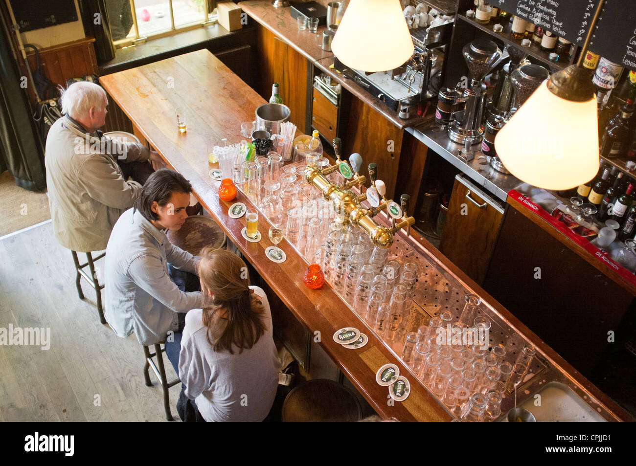 People sat a bar in the Dutch town of Delft Stock Photo