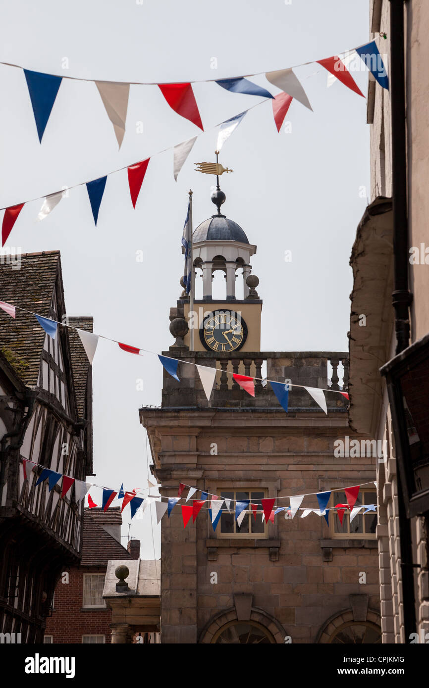 The Buttercross with bunting, at the top of Broad Street, Ludlow, Shropshire Stock Photo