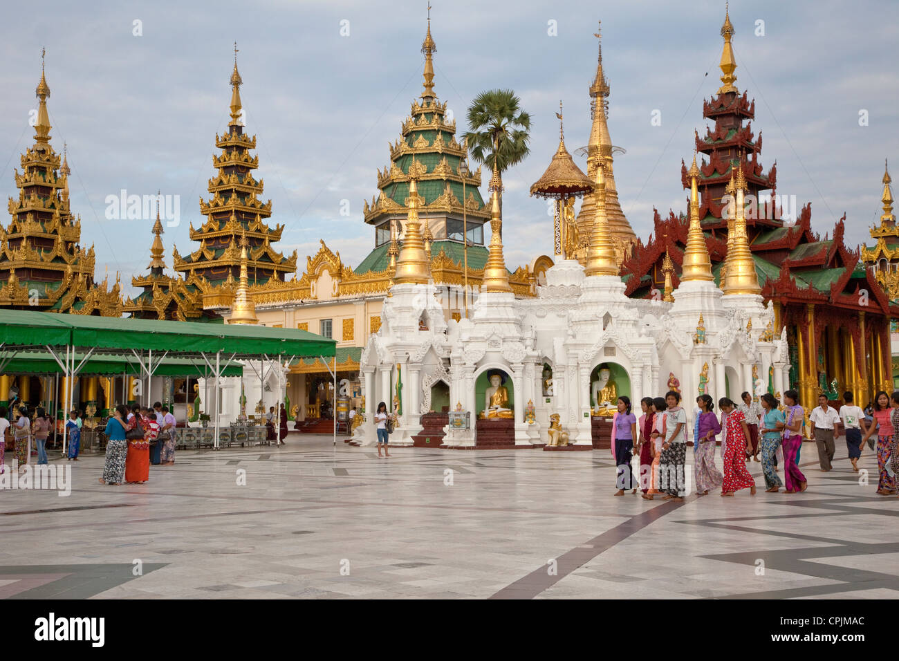 Myanmar, Burma. Shwedagon Pagoda, Yangon, Rangoon. Many shrines encircle the walkway around the main stupa. Stock Photo
