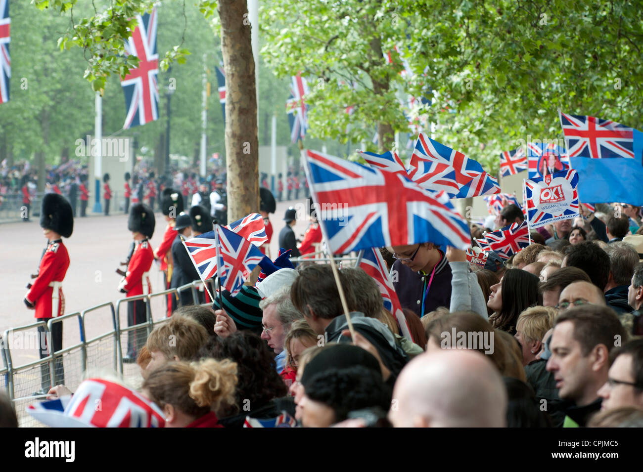 Spectators waiting for the arrival of the wedding procession of Prince