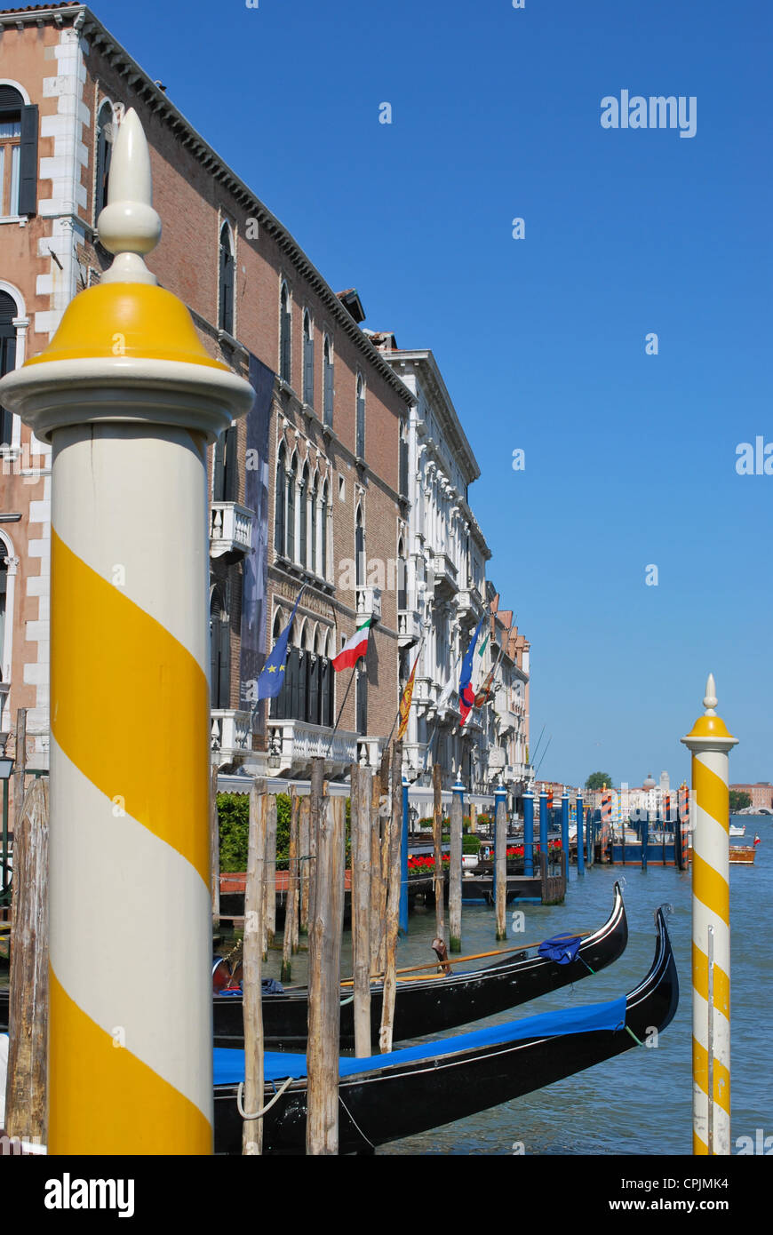 Colorful ancient houses and gondola boats on Grand Canal, Venice, Italy ...