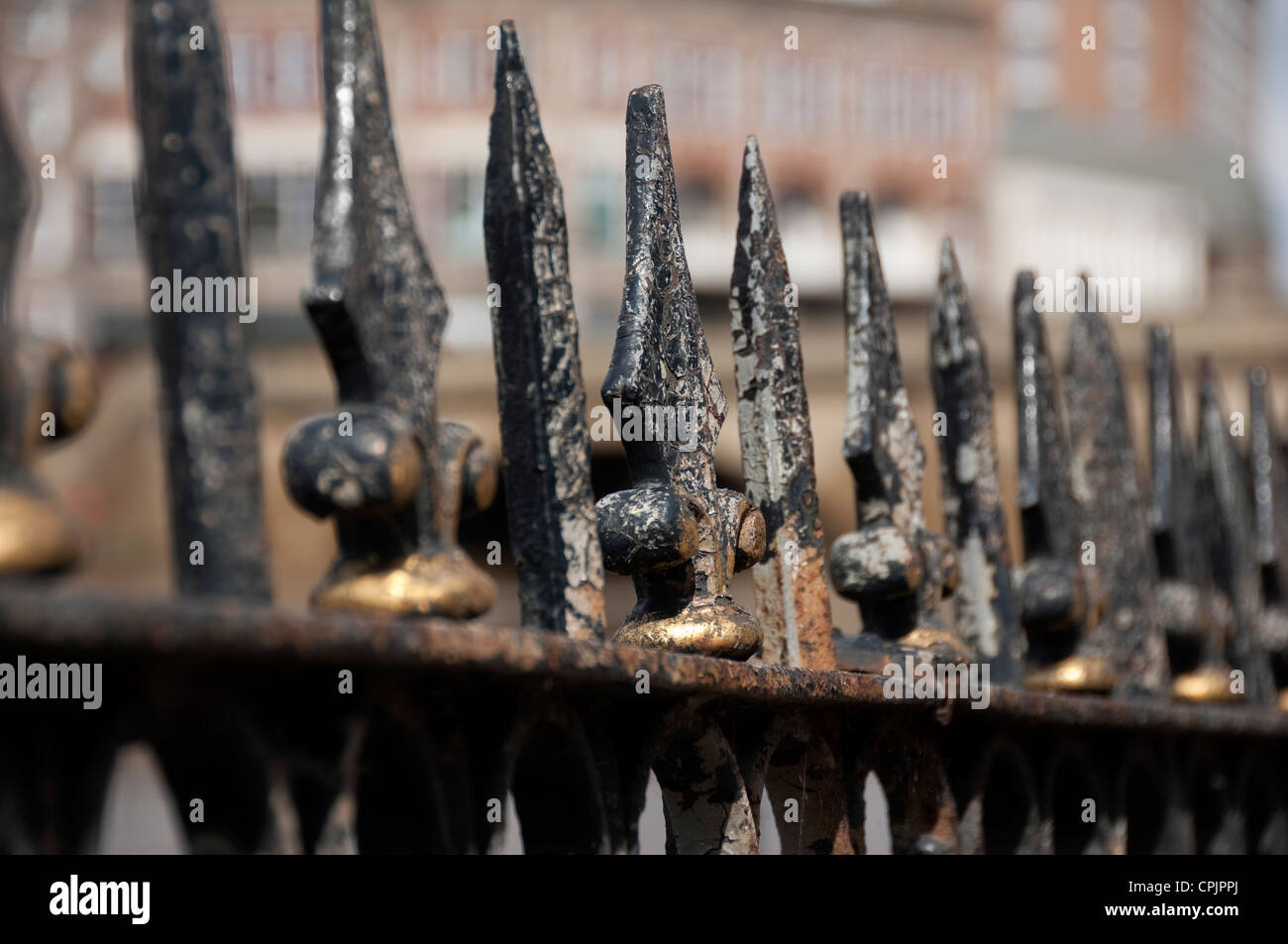 Close up of old rusty wrought iron railings railing England UK Stock Photo