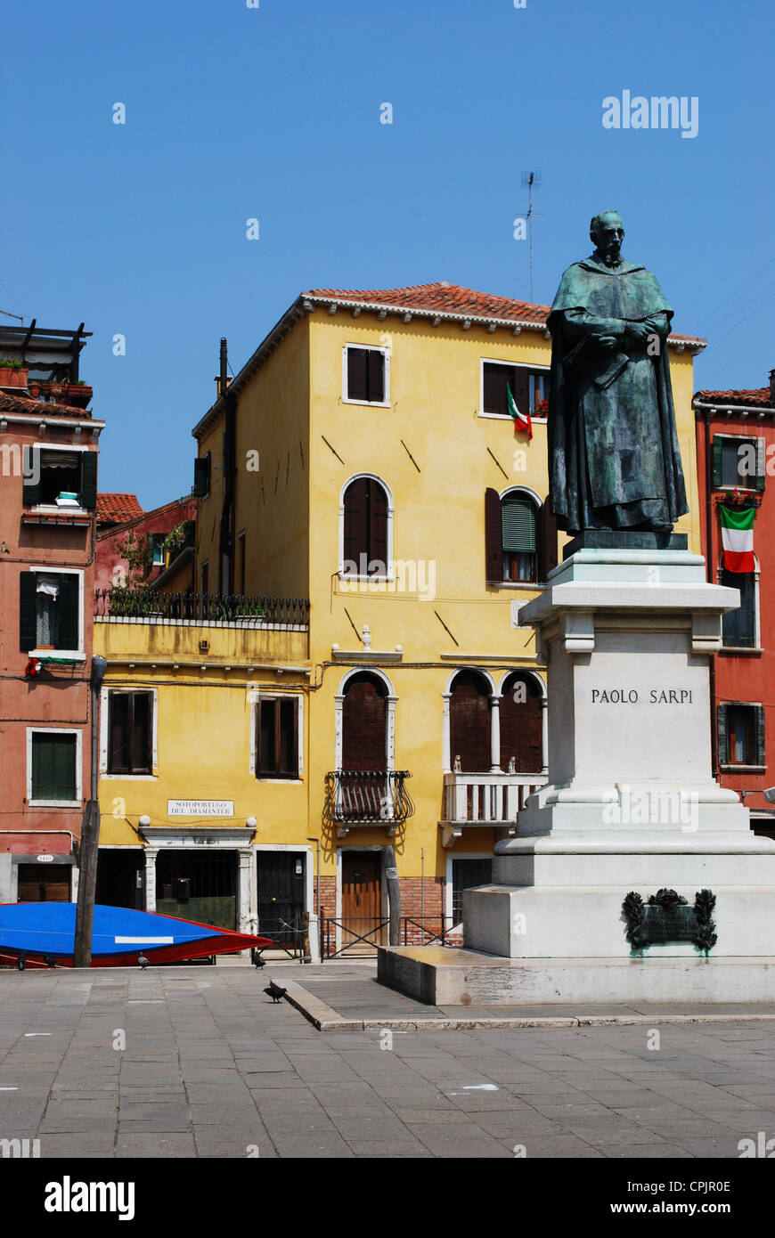 Architecture of colorful ancient houses and statue, Venice, Italy Stock ...