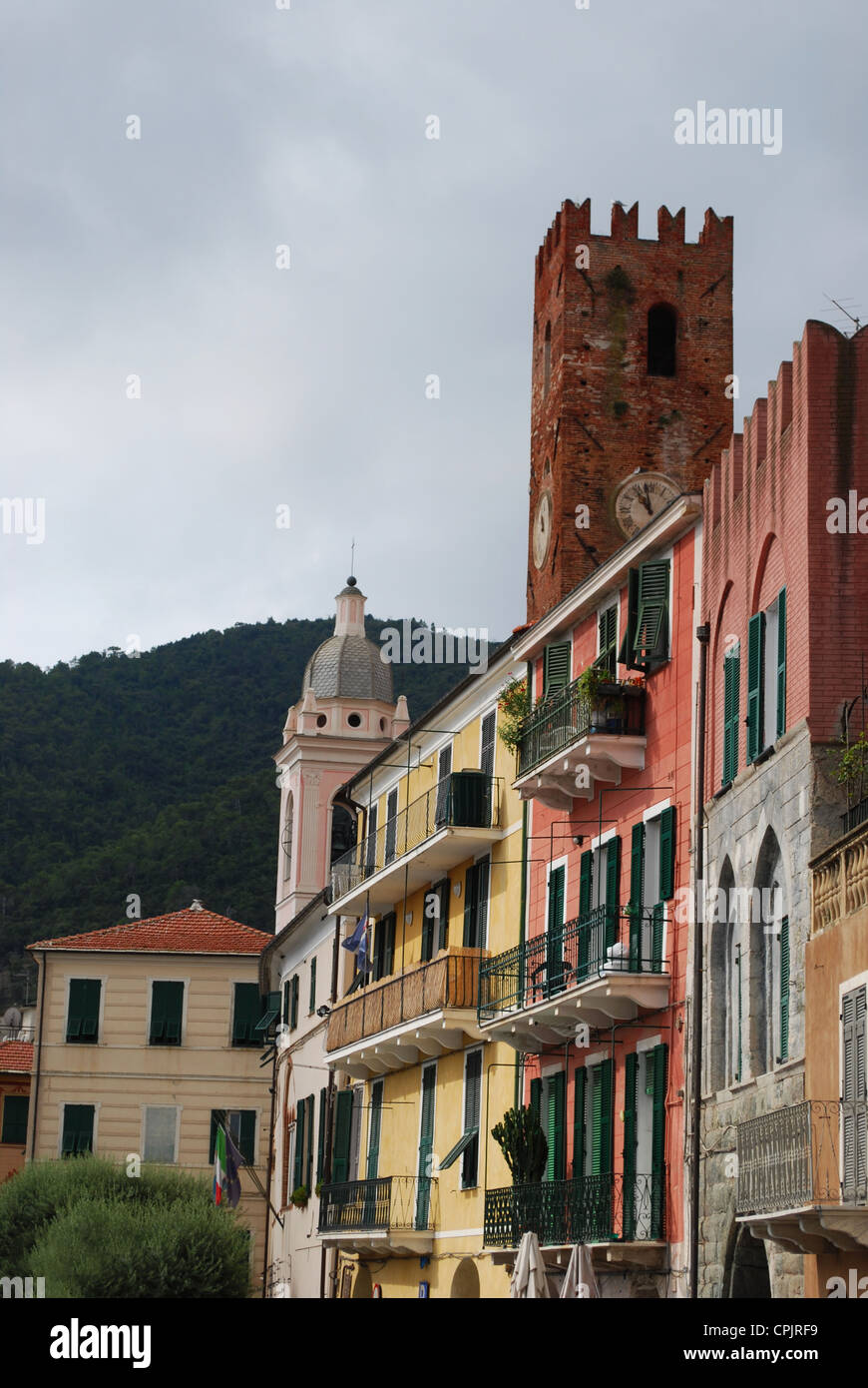 Colorful houses and medieval tower, Noli village, Liguria, Italy Stock Photo