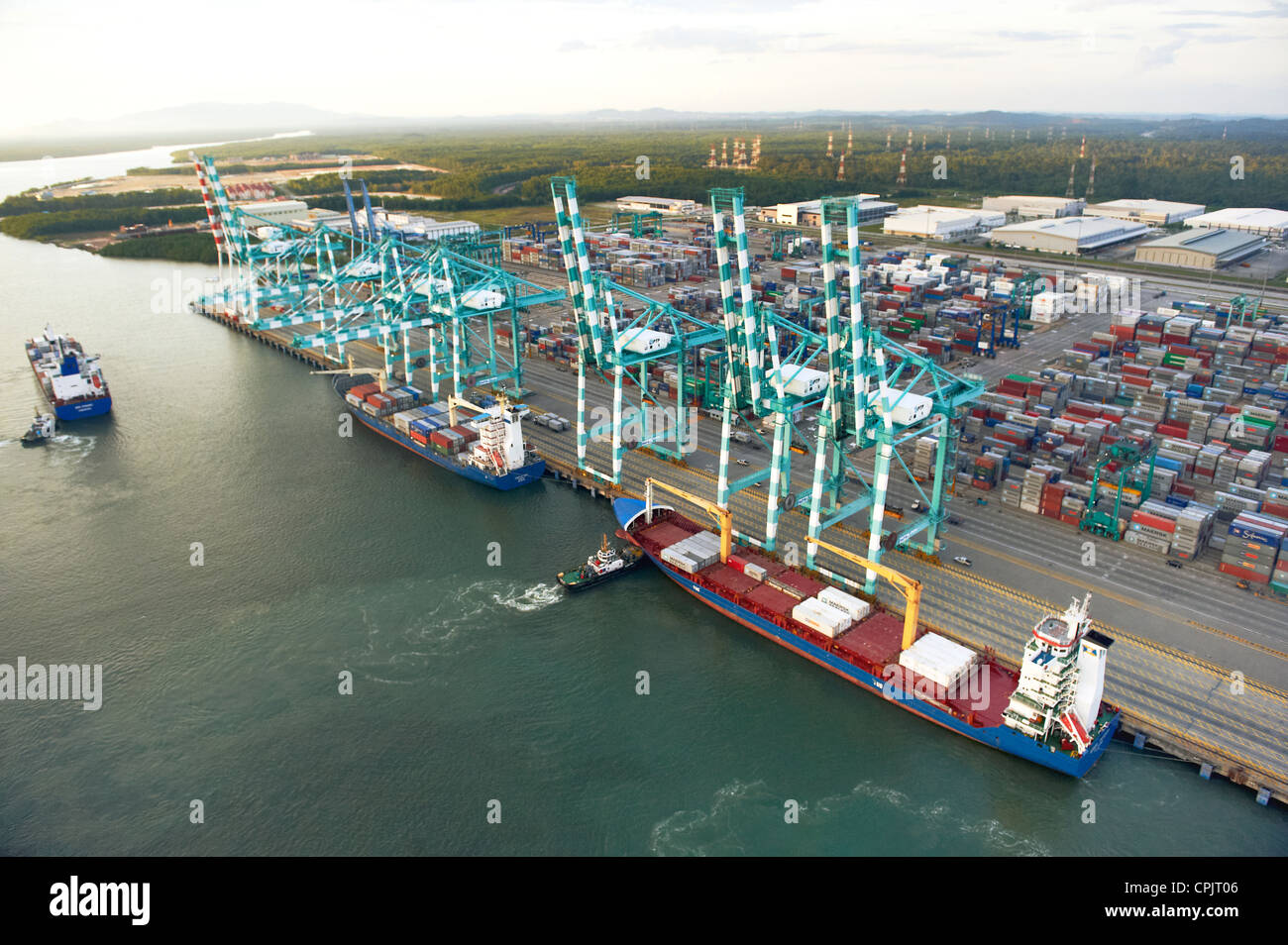 Freighter Ships docked at the container terminal shipping port in Johor