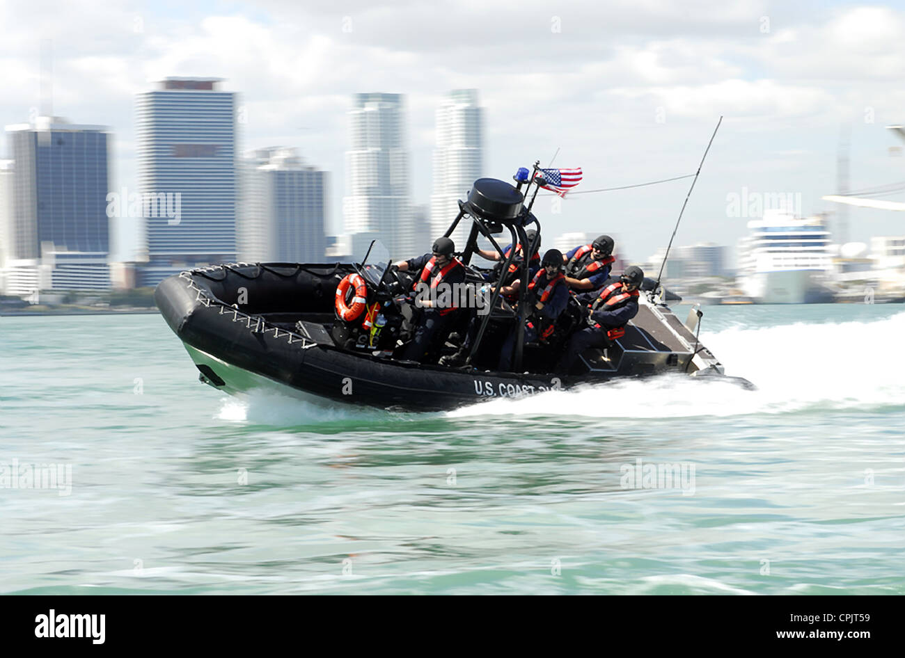 A Coast Guard Maritime Safety and Security Team conducts high-speed maneuvers during a security patrol south of the Port of Miami March 9, 2009 in Miami, Florida. Stock Photo