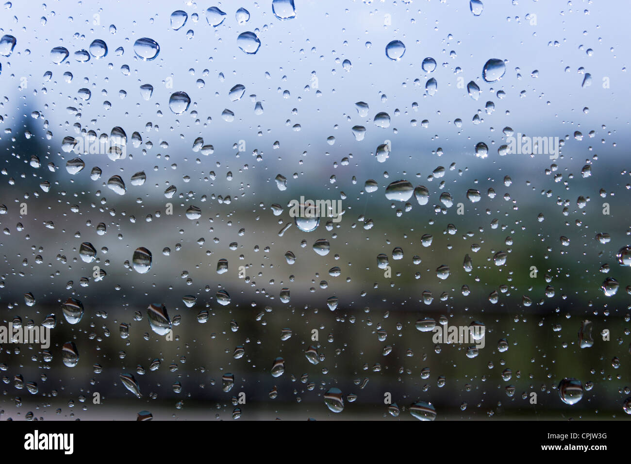 Raindrops on windowpane. Stock Photo