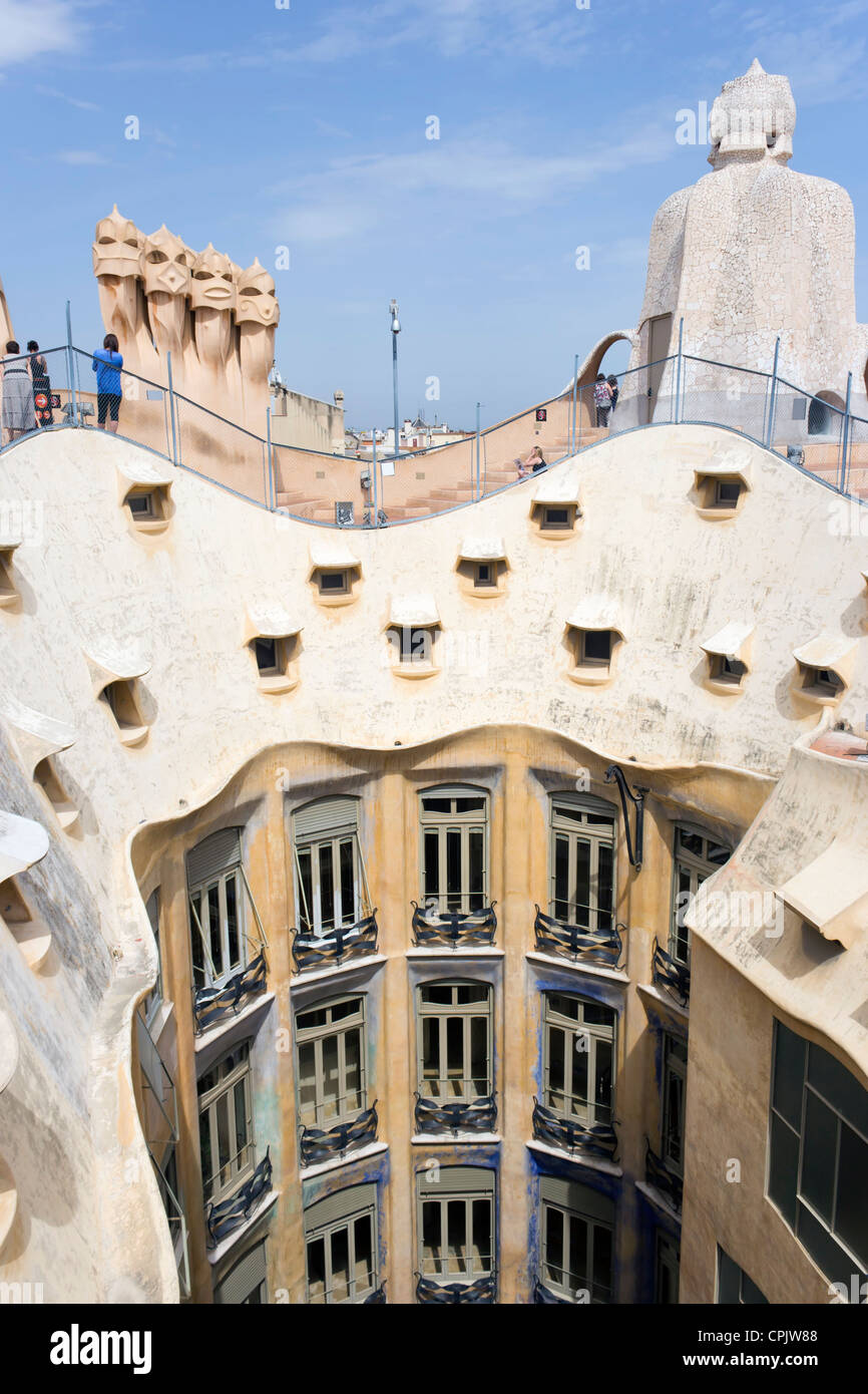 Passeig de Gràcia, Barcelona, Catalonia, Spain. Ventilation towers on the roof of the Casa Milà, better known as La Pedrera . Stock Photo