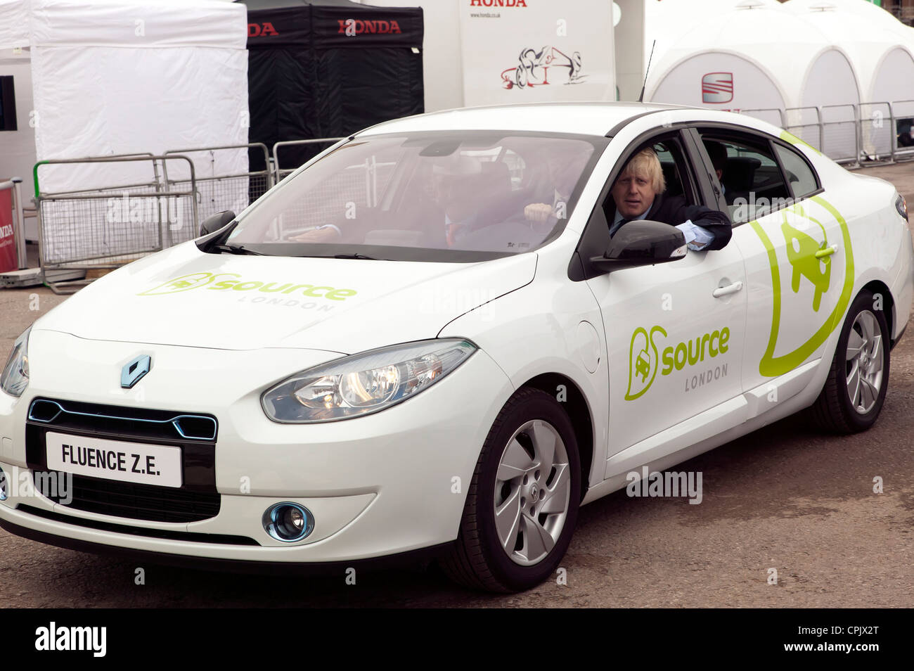 Boris Johnson, Mayor of London, drives a Renault Fluence Z.E., at the start of ecovelocity 2011. Stock Photo