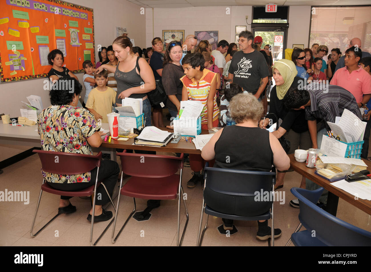 A shot clinic fills with those seeking vaccines for immunization from swine flu or H1N1 virus. Stock Photo