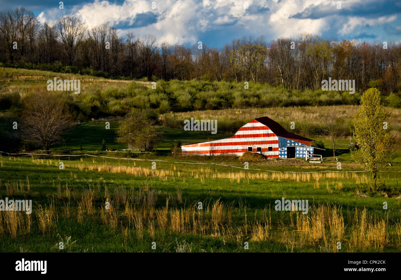 This barn with an American Flag painted on it is in Portersville, PA. Stock Photo