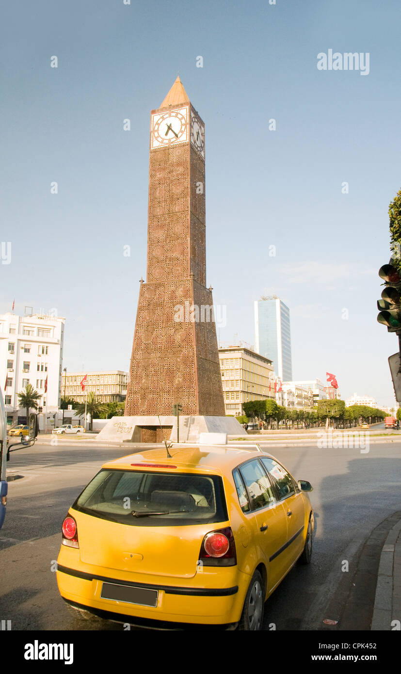 Clock Tower ave Habib Bourguiba Ville Nouvelle Tunis Tunisia Africa yellow taxi cab Stock Photo