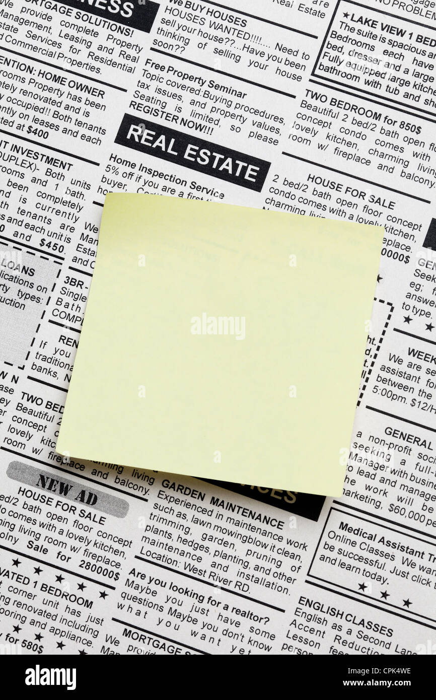 Fake Classified Ad, newspaper and sticky note Stock Photo Alamy