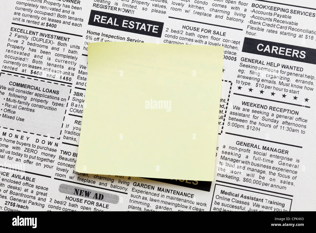 Fake Classified Ad, newspaper and sticky note Stock Photo Alamy