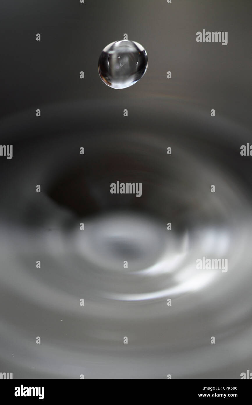 A water droplet falling Stock Photo Alamy