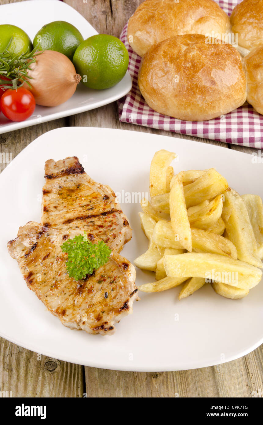Grilled pork chops french fries hires stock photography and images Alamy