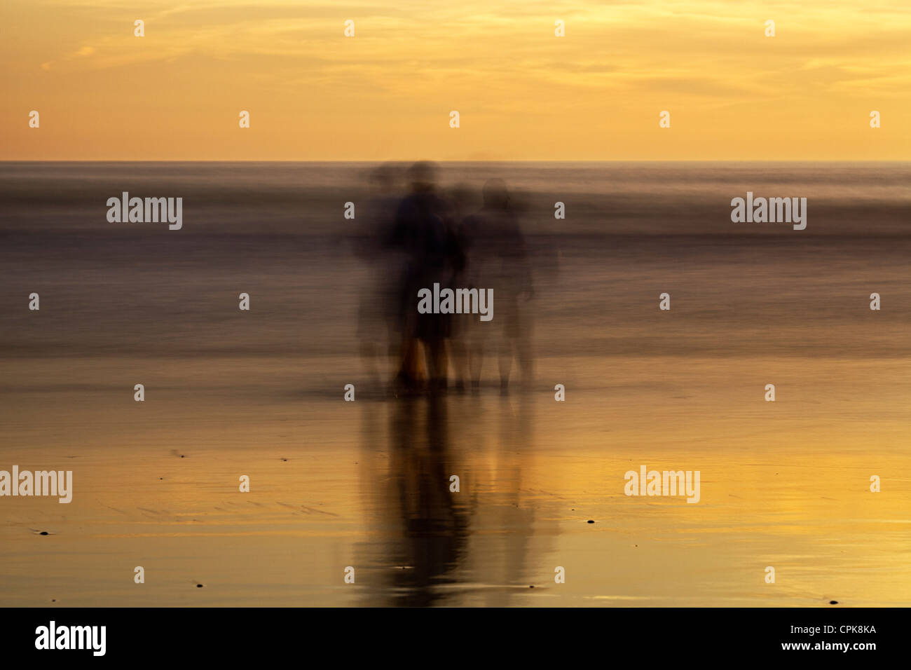 People on the beach. Daylight long exposure shot by the use of neutral density filters. Stock Photo