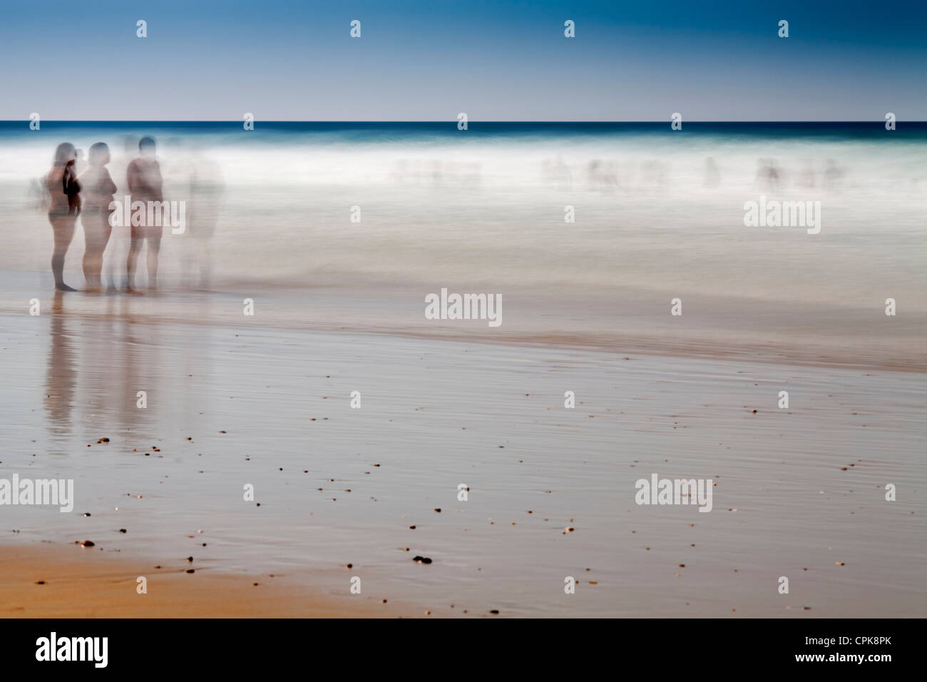 People on the beach. Daylight long exposure shot by the use of neutral density filters. Stock Photo