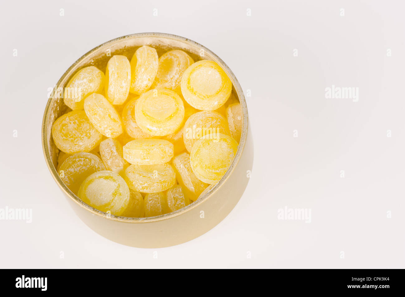 Classic round sour candy drops in their can Stock Photo Alamy