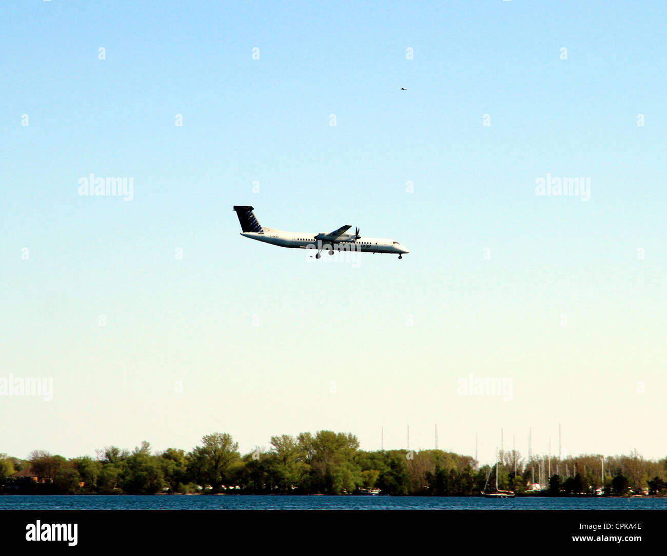 A Porter Airlines airplane landing at the Toronto Island Airport Stock Photo