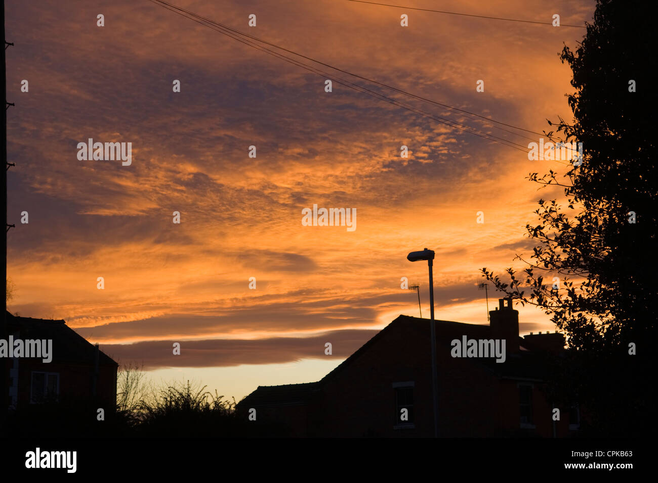 Sunset over roof tops Worcester Worcestershire England UK Stock Photo
