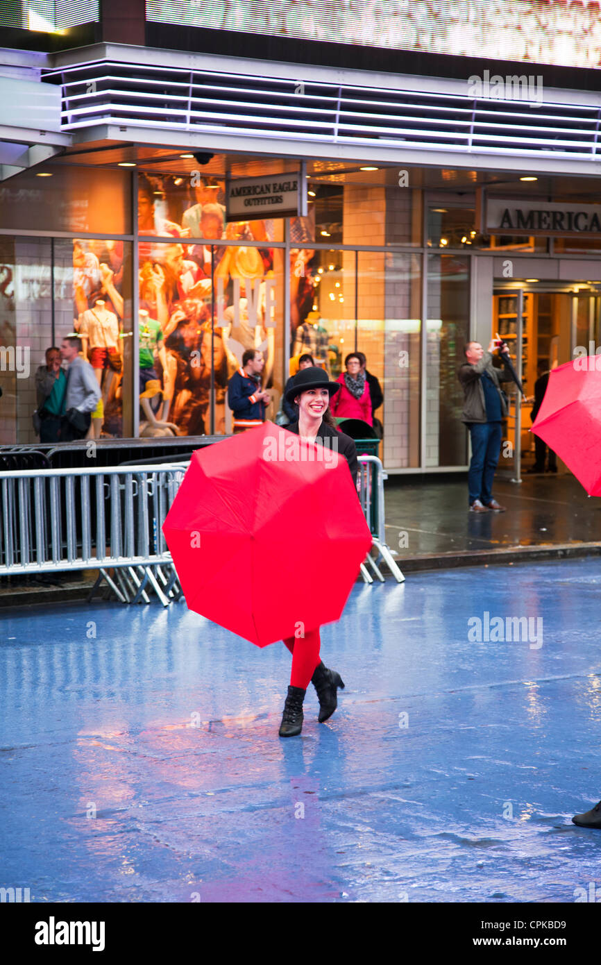 Dancing girls advertising & handing out leaflets for tickets for hit show 