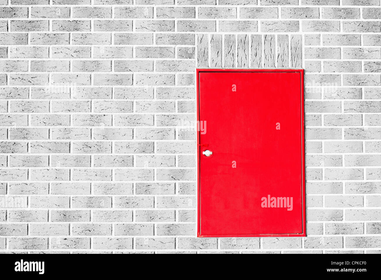 Red fire box in the wall. Stock Photo