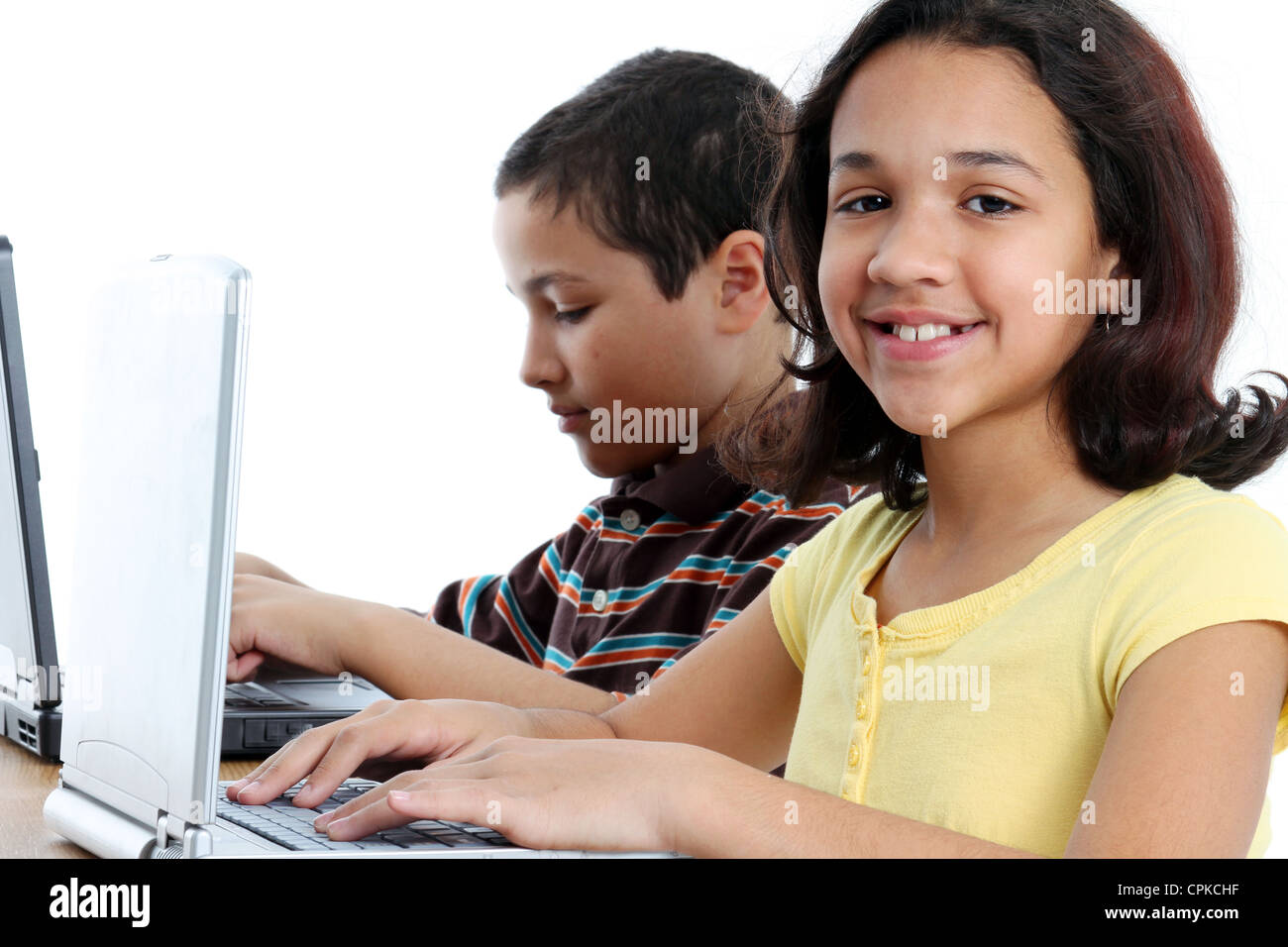 Picture of children on computer set on white background Stock Photo - Alamy