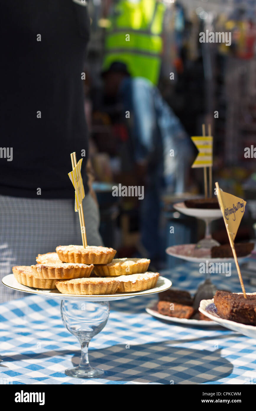street market selling cakes Brixton Stock Photo Alamy
