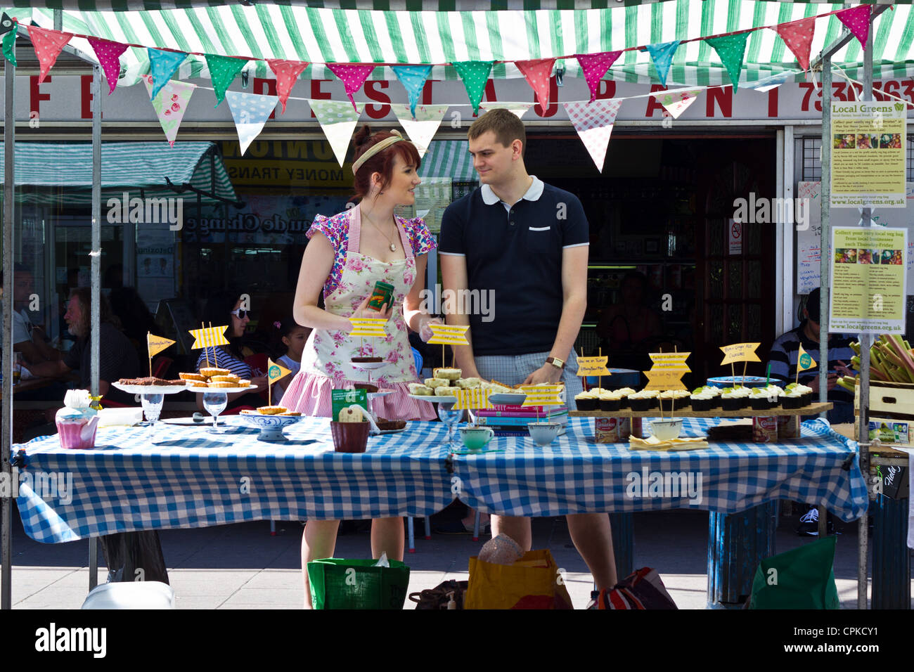 street market selling cakes Brixton Stock Photo Alamy