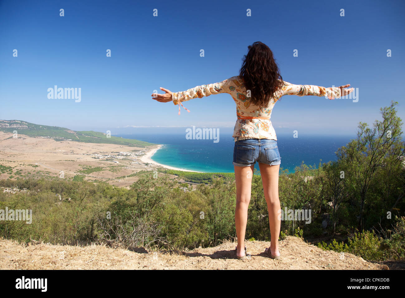 Woman over Bolonia beach at Cadiz Andalusia in Spain Stock Photo