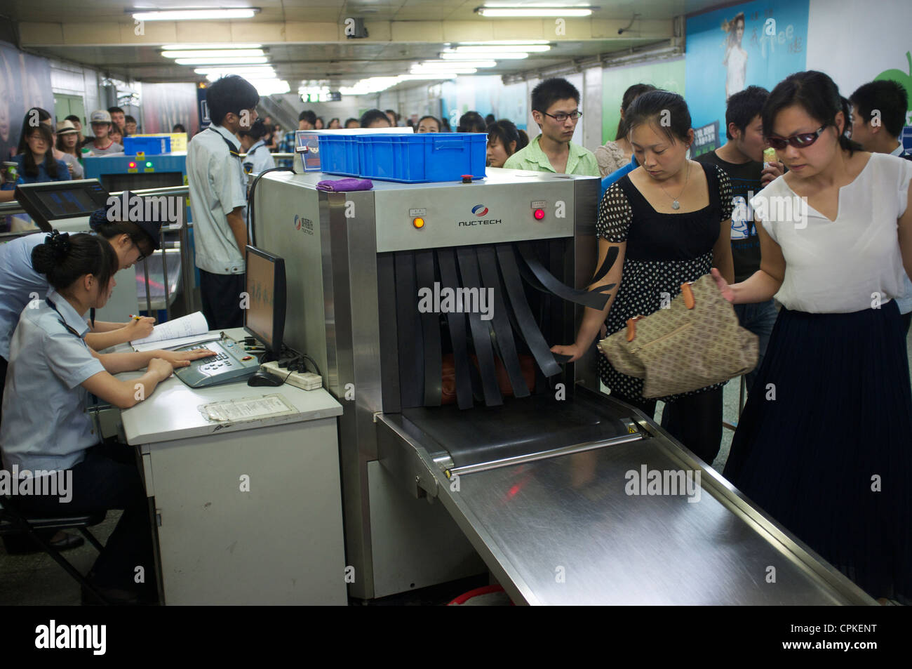 Subway security bag check in Beijing, China. 25May2012 Stock Photo