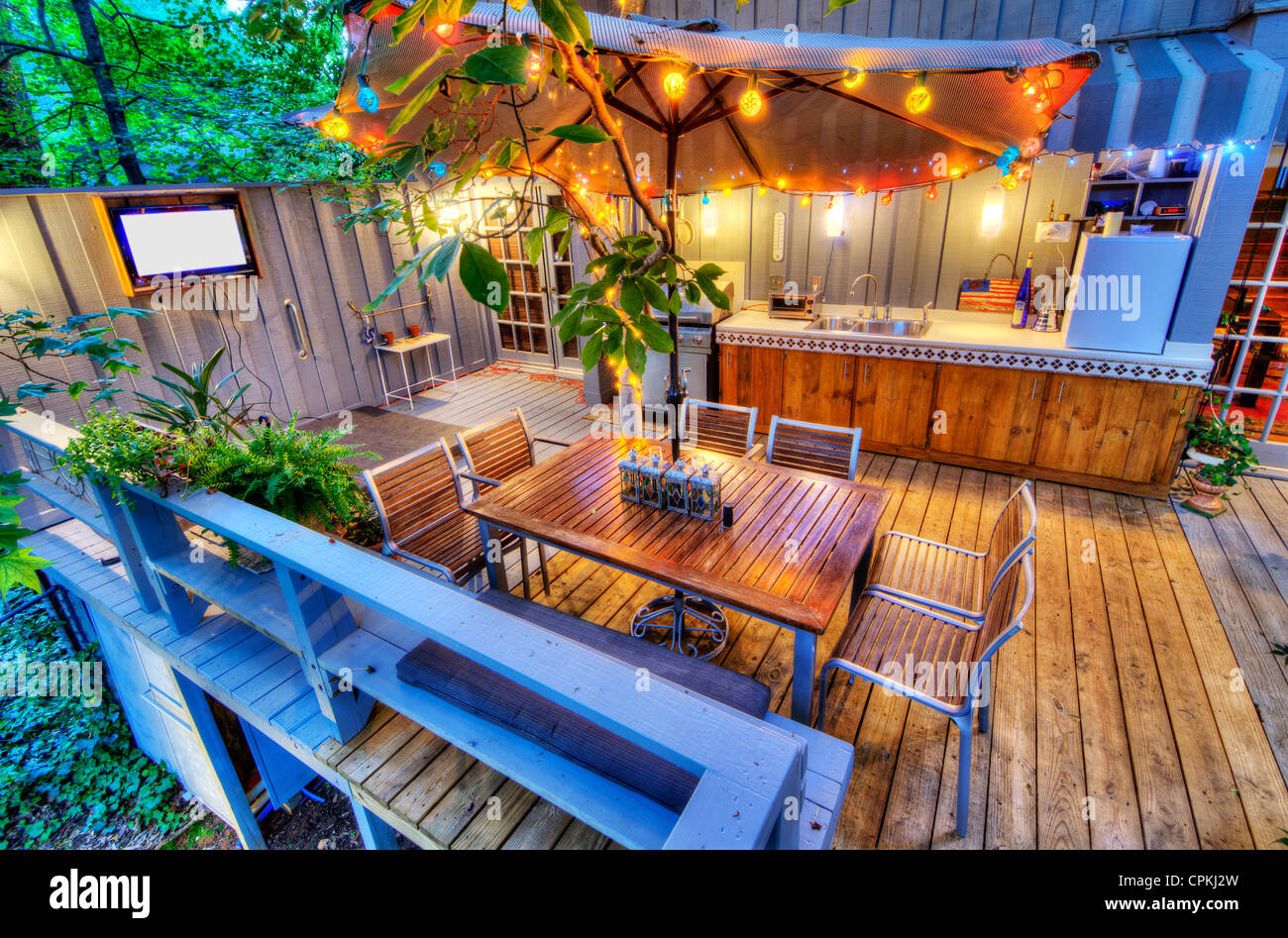 nice patio at a home in the woods Stock Photo Alamy