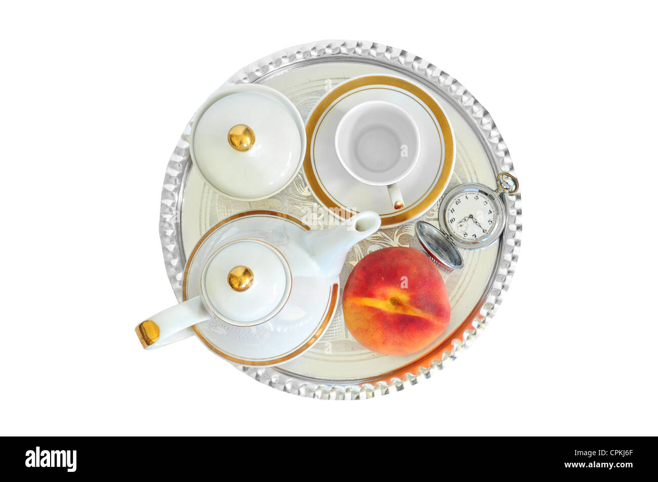 Coffee set, apricot and pocket watch, arranged for breakfast on sliver tray Stock Photo