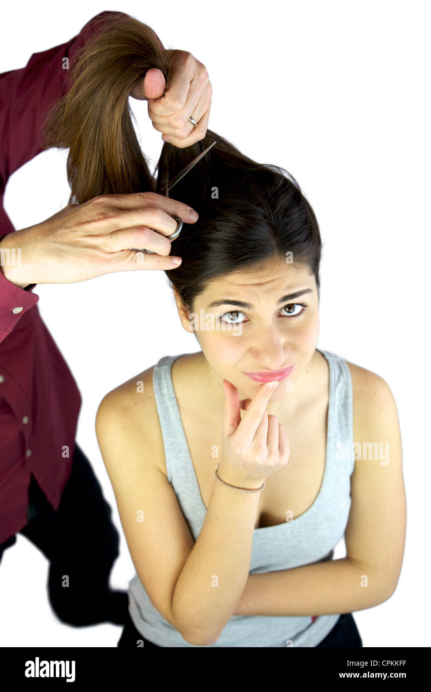 Hairdresser Cutting Very Long Hair While Female Model Is Doubtful