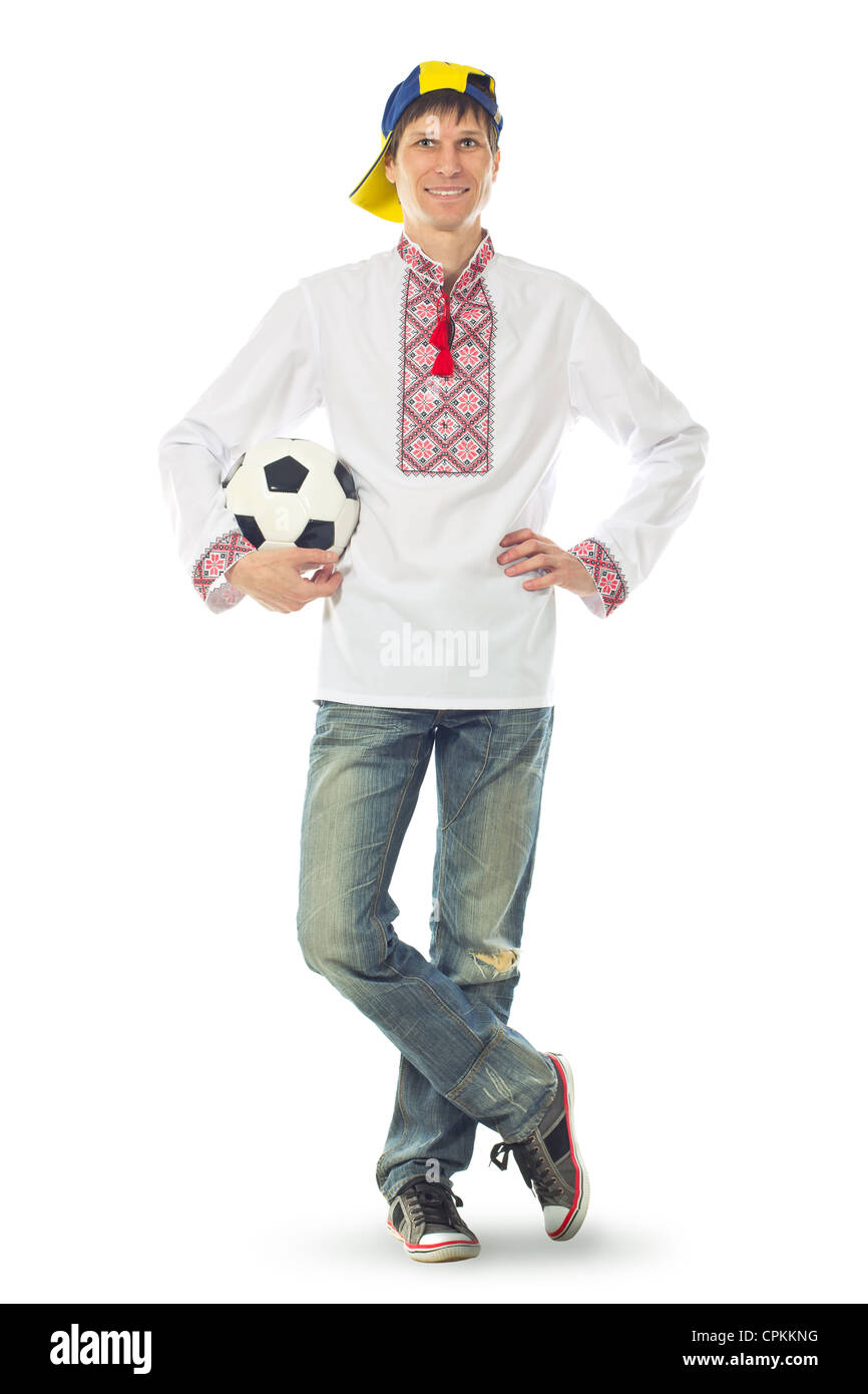 Ukrainian man in the national shirt with a ball on a white background Stock Photo