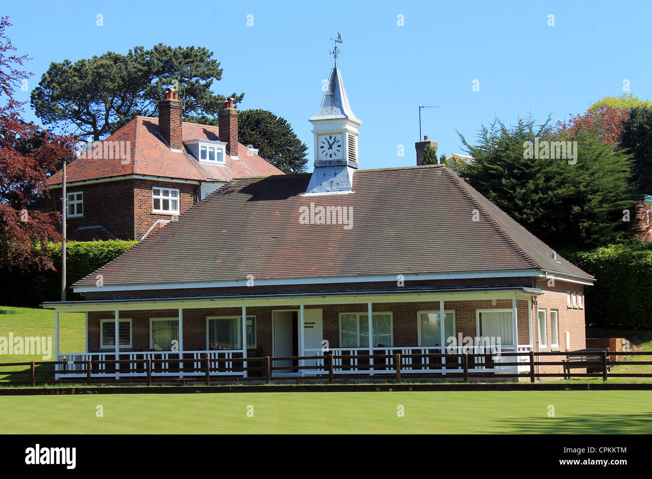 Traditional English bowling green pavilion building in summer. Stock Photo