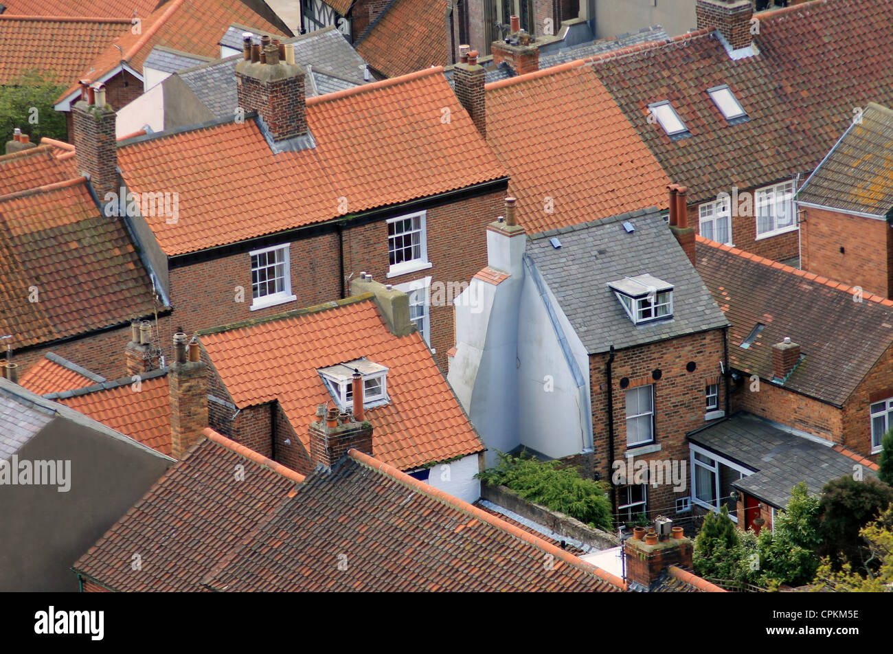Aerial view of urban housing showing rooftops. Stock Photo