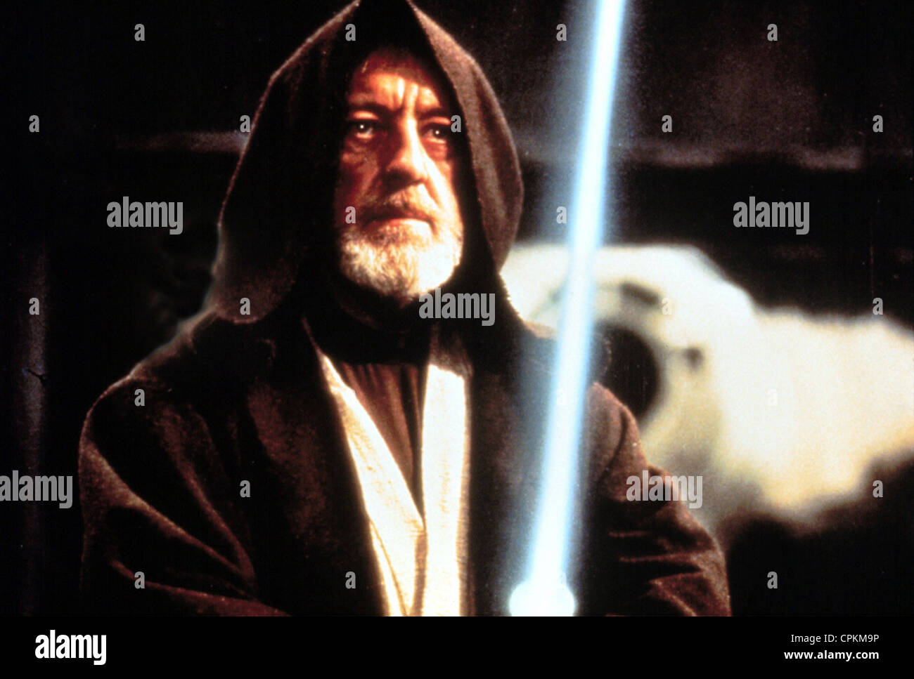 A portrait of Sir Alec Guinness in the 1977 film Star Wars. He is Ben Obi-Wan Kenobi. Stock Photo